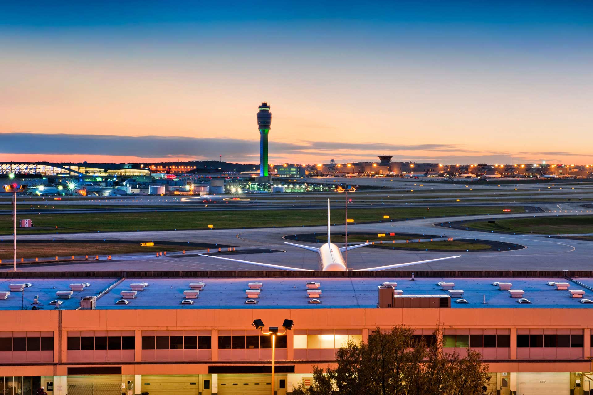 AtlantaHartsfieldJacksonAtlantaInternationalAirportSunsetPlanes The tarmac at Atlanta Airport, Georgia.